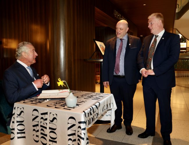 HRH The Prince of Wales with Ian Wilson and Colin Loughran Grand Opera House visitor book signing